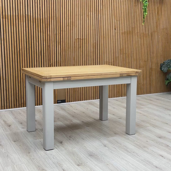 Product video tour of the ‘Lewis’ Solid Oak Extending Table, demonstrating the smooth action of the pull-out draw-leaves and the table's overall stability.
