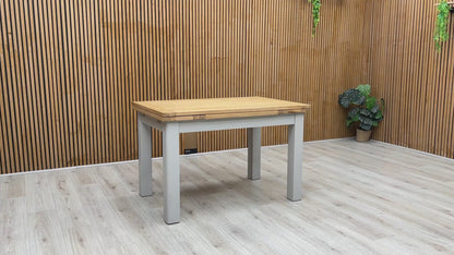 Product video tour of the ‘Lewis’ Solid Oak Extending Table, demonstrating the smooth action of the pull-out draw-leaves and the table's overall stability.