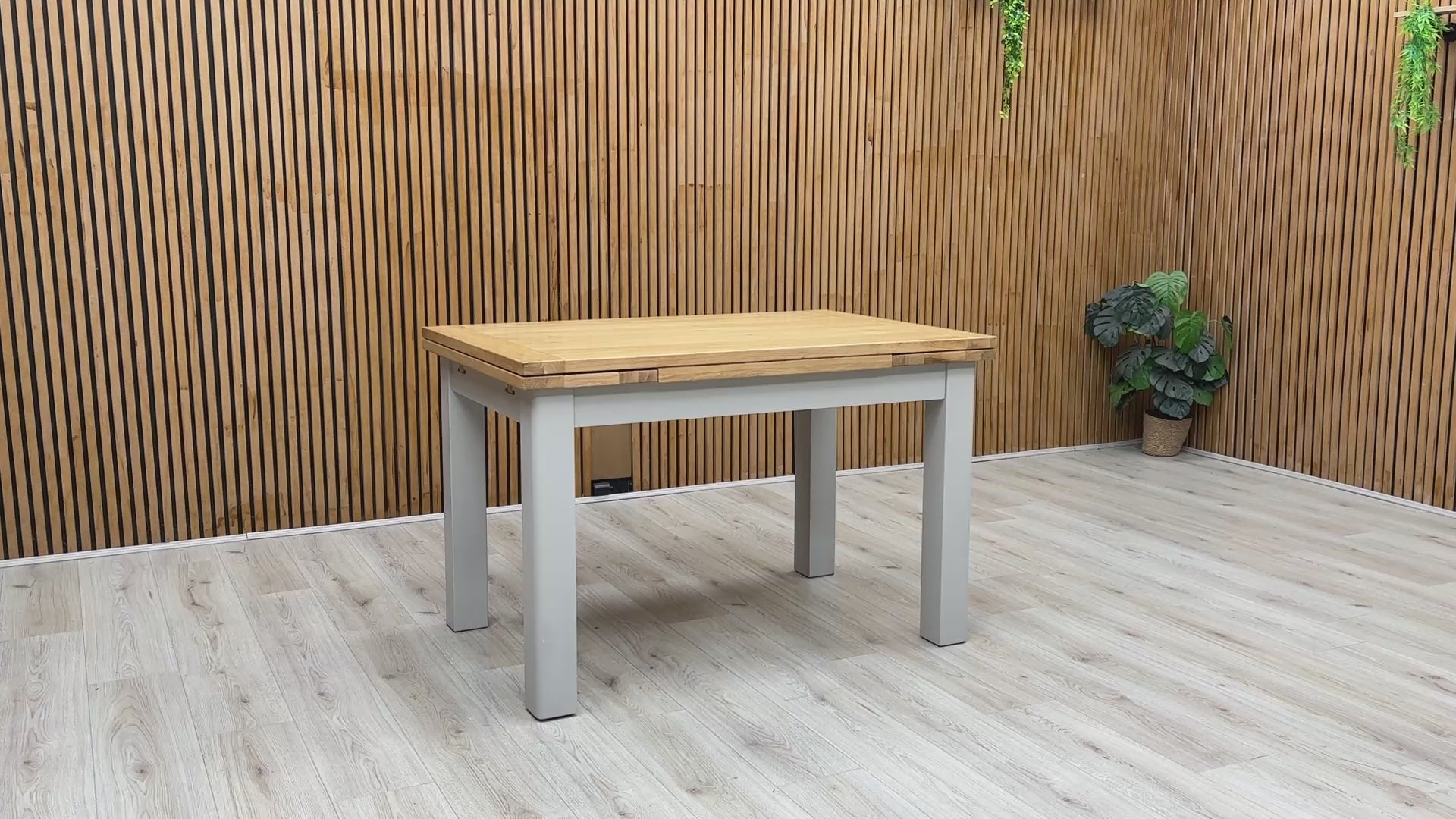 Product video tour of the ‘Lewis’ Solid Oak Extending Table, demonstrating the smooth action of the pull-out draw-leaves and the table's overall stability.