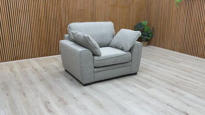  Video Sort Silver Woven Fabric Armchair, emphasizing the contemporary style and visible wooden feet