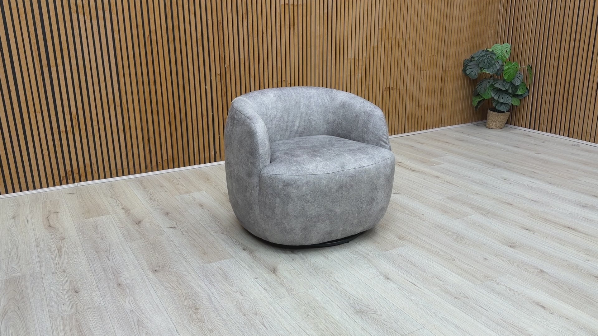 Video demonstration of the ‘Terry’ accent chair, showcasing the smooth 360-degree swivel mechanism and the tactile quality of the silver velvet fabric.