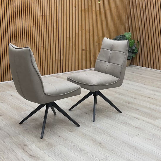Product video tour of the ‘Germain’ Taupe Faux Leather Swivel Dining Chairs, demonstrating the smooth auto-return swivel mechanism, fabric durability, and overall structural stability.