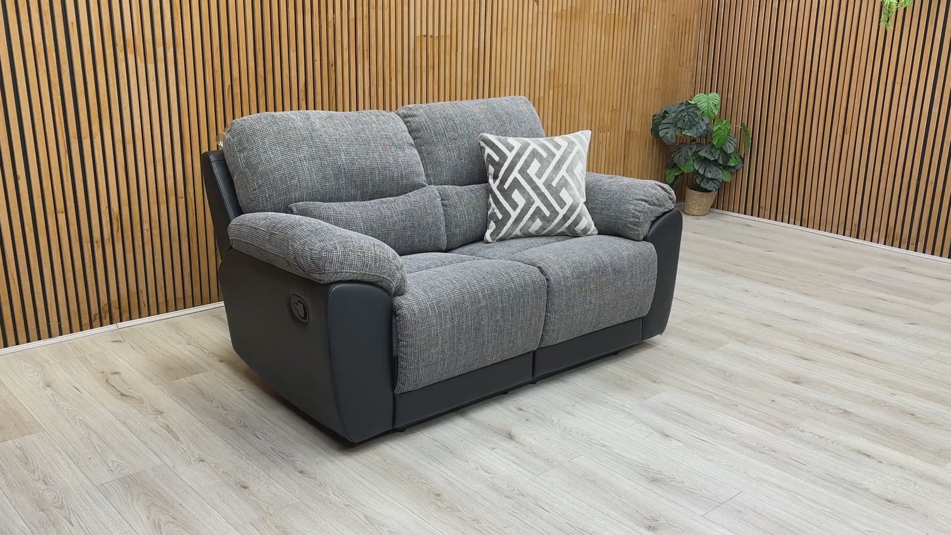 Video demonstration showing the manual recliner mechanism and high-back support of the 'Santori' sofa.