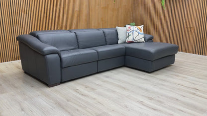 Product video tour of the Nicoletti Galileo Power Recliner Chaise Sofa, demonstrating the smooth power mechanism, premium leather texture, and superior Italian build quality.