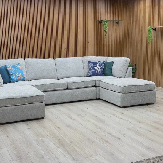 Video Of ‘Emilia’ grand contemporary U-shaped corner sofa, beautifully upholstered in a luxurious, plush Silver soft hopsack chenille fabric.