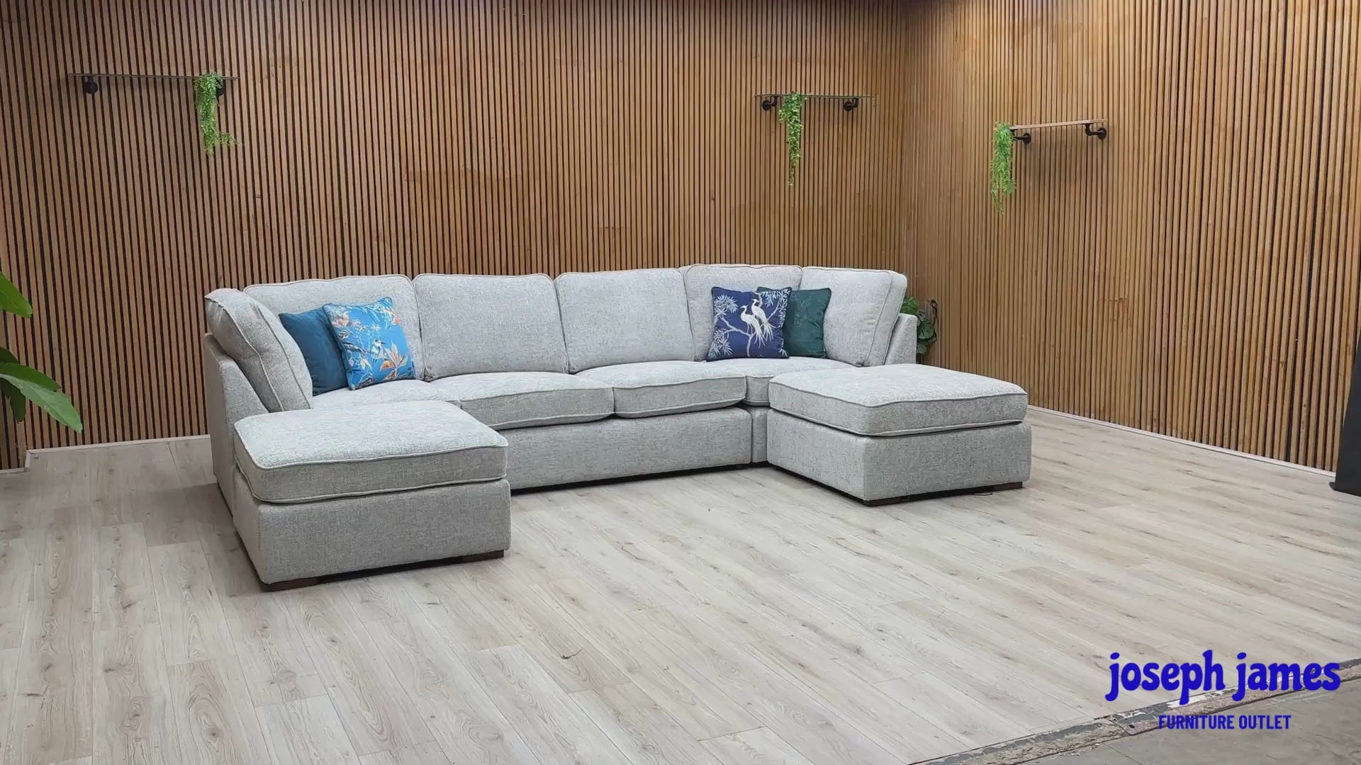 Video Of ‘Emilia’ grand contemporary U-shaped corner sofa, beautifully upholstered in a luxurious, plush Silver soft hopsack chenille fabric.