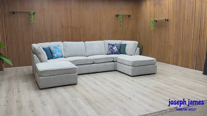 Video Of ‘Emilia’ grand contemporary U-shaped corner sofa, beautifully upholstered in a luxurious, plush Silver soft hopsack chenille fabric.