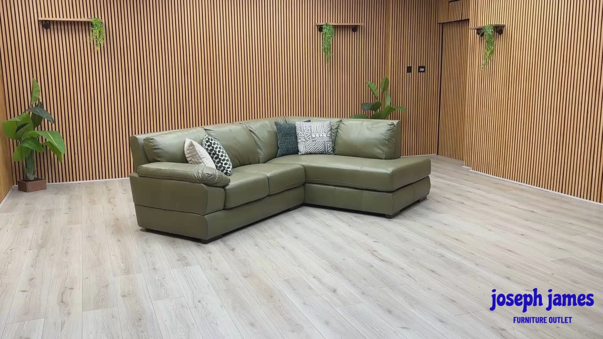 Video Of ‘Marlow’ contemporary right-hand facing corner chaise sofa, beautifully tailored in luxurious, high-grade Olive Green Italian leather upholstery.