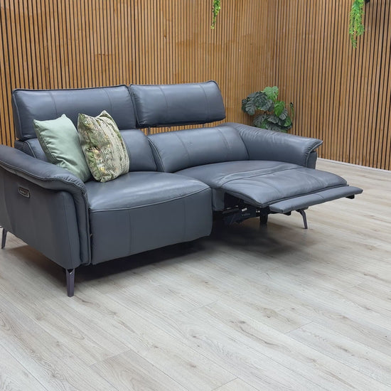 Video of Furniture Village ‘Jude’ luxury 3-seater power recliner sofa, meticulously tailored in premium Montana lavender grey leather upholstery.