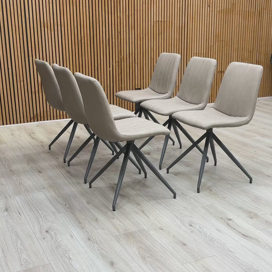 Video for a product video demonstrating the quality and features of the 'Isaac' Taupe Faux Leather Dining Chair (Set of 6).