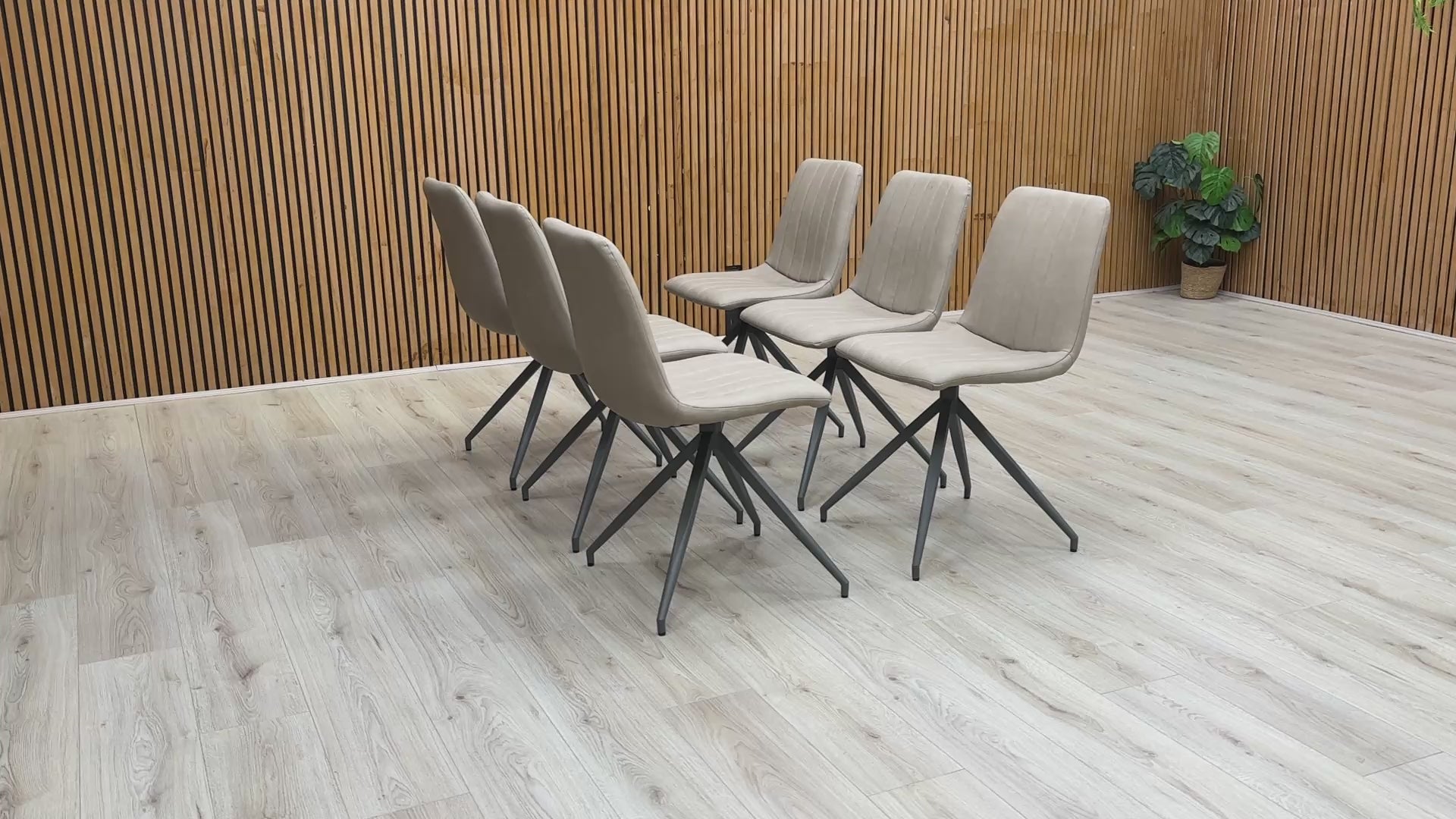 Video for a product video demonstrating the quality and features of the 'Isaac' Taupe Faux Leather Dining Chair (Set of 6).