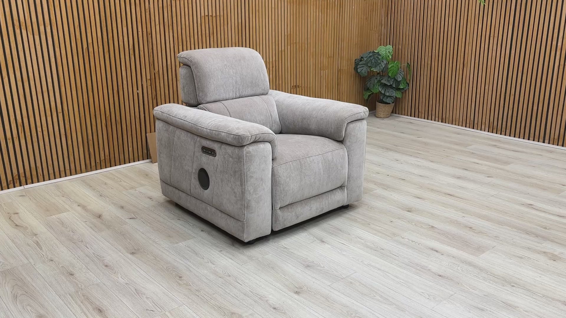Video demonstration of the 'Genius' media chair reclining and showcasing the Bluetooth speaker functionality.