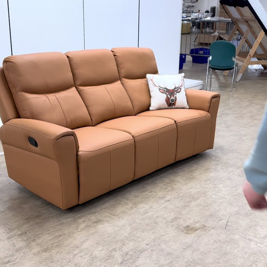 Video demonstration of the manual reclining mechanism on the 'Irene' tan leather sofa.