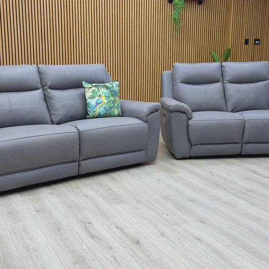 Product tour of the ‘Bobby Cat’ Steel Grey Leather Set, demonstrating the silent power motor, the extension of the footrests, and the supple texture of the leather.