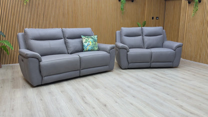 Product tour of the ‘Bobby Cat’ Steel Grey Leather Set, demonstrating the silent power motor, the extension of the footrests, and the supple texture of the leather.