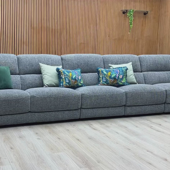 Video Of ‘Nova’ contemporary extra-large living room suite, showcasing a luxury 5-seater power recliner sofa beautifully upholstered in Fab Cac R450 Gun Metal Grey fabric.