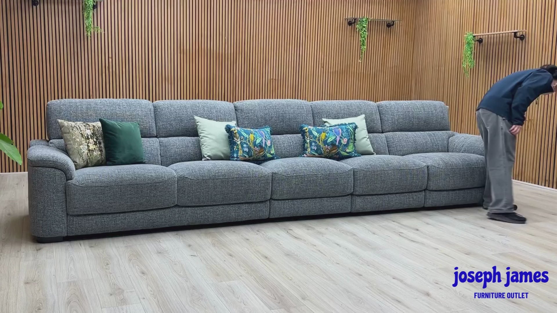 Video Of ‘Nova’ contemporary extra-large living room suite, showcasing a luxury 5-seater power recliner sofa beautifully upholstered in Fab Cac R450 Gun Metal Grey fabric.