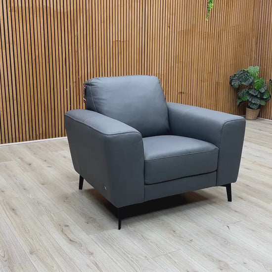 Video Of ‘Bocelli’ contemporary armchair, beautifully upholstered in luxurious Tatto Grey 4370 premium leather with clean, modern architectural lines.