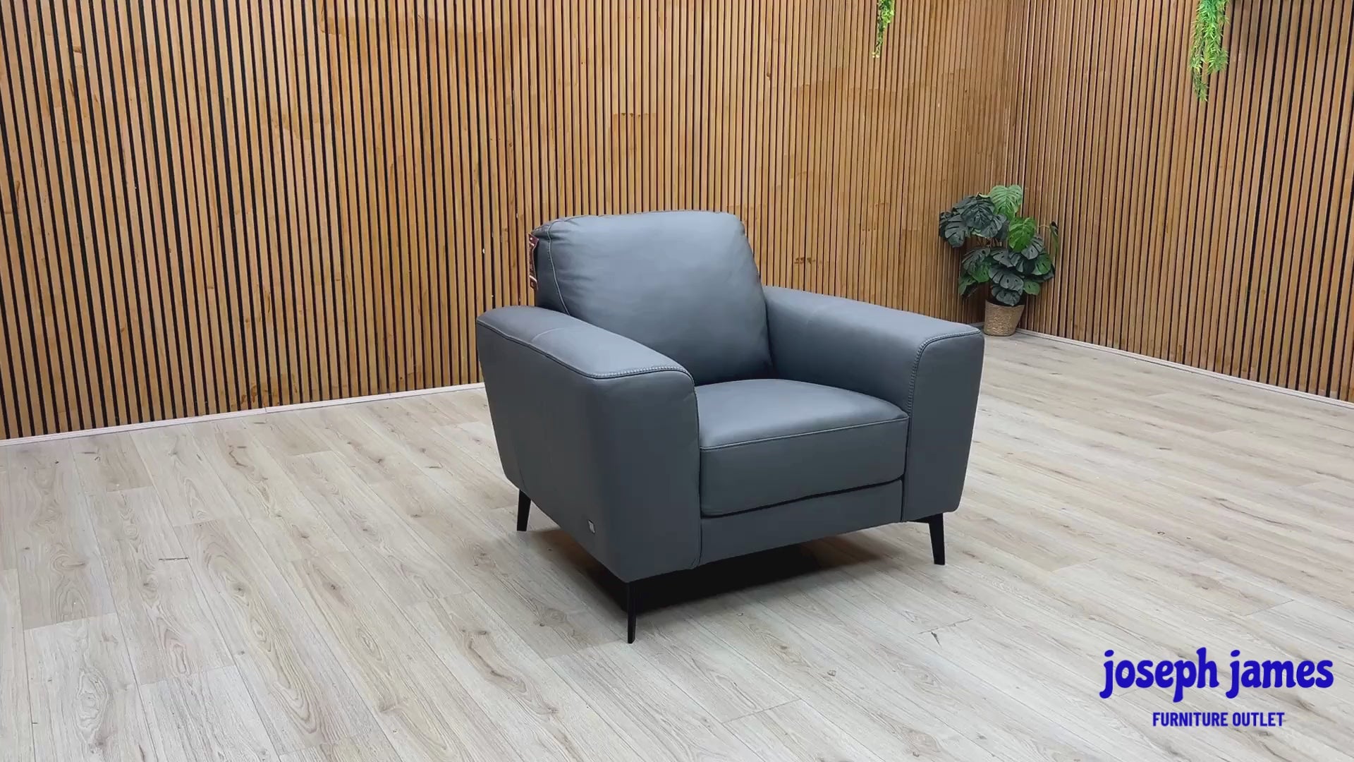 Video Of ‘Bocelli’ contemporary armchair, beautifully upholstered in luxurious Tatto Grey 4370 premium leather with clean, modern architectural lines.