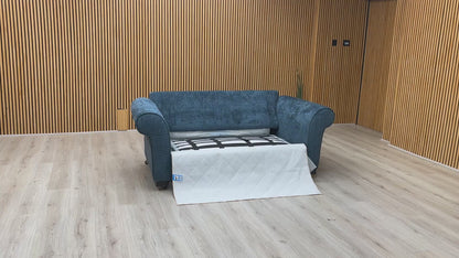 Product video tour of the ‘Hedingham’ Neptune Blue Bromley Chenille 2-Seater Sofa Bed, demonstrating the smooth transition from sofa to bed and the mattress quality.
