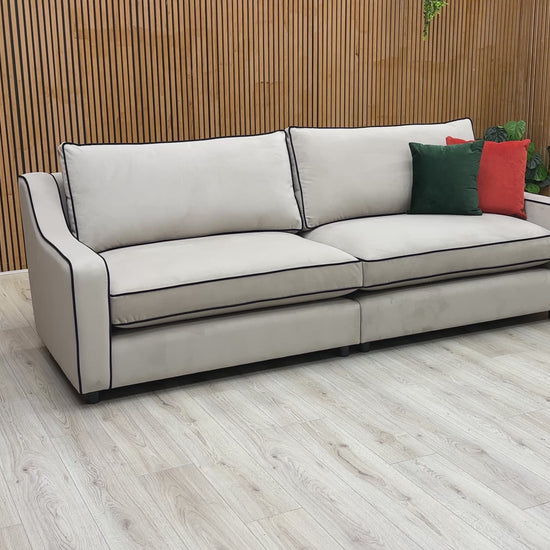 Video of the 'Celine' 4 Seater Split Sofa, showcasing the smooth upholstery and modern shape of the back frame.