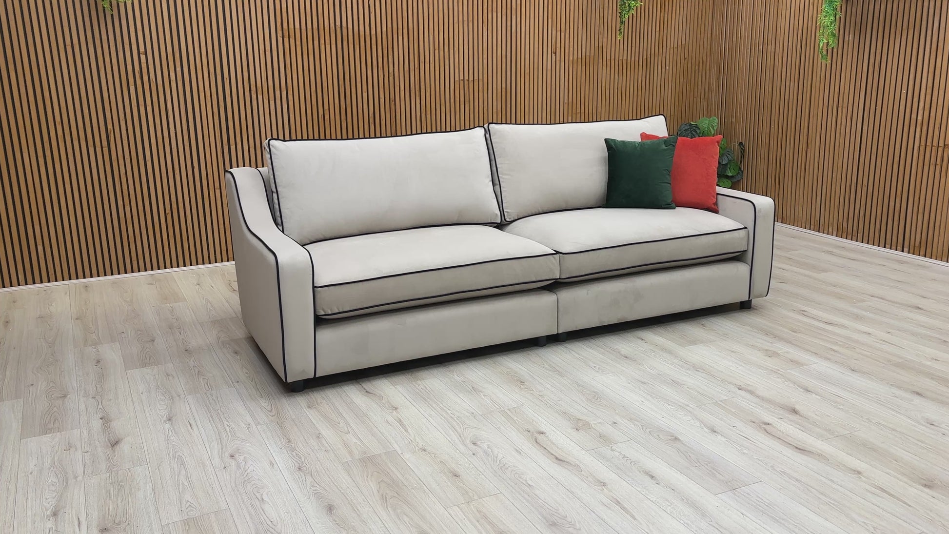 Video of the 'Celine' 4 Seater Split Sofa, showcasing the smooth upholstery and modern shape of the back frame.