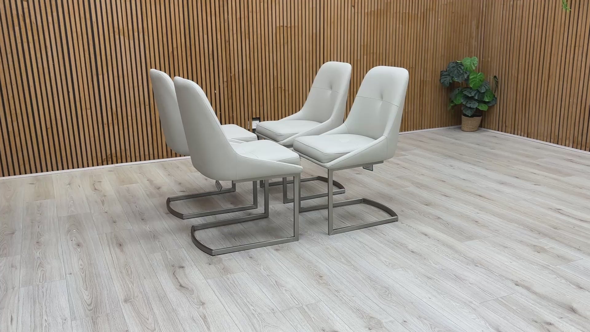 Video preview demonstrating the style and features of the 'Avorio' Faux Leather Dining Chairs.