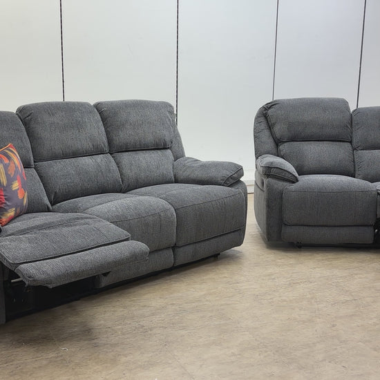 Product walkthrough video showing the reclining features and storage console of the Costa sofa set.
