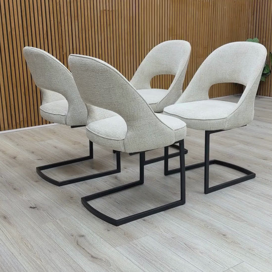 Video Of 'Tiber’ contemporary dining suite, featuring a matching set of 4 cantilever dining chairs beautifully upholstered in a sophisticated Alabaster Beige fabric.