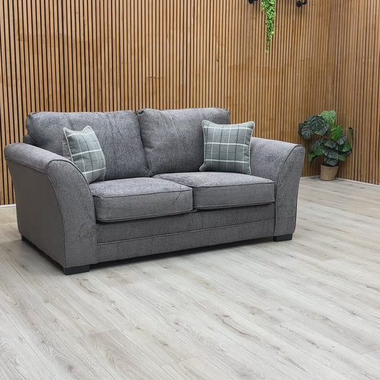 Product video tour of the ‘Sophie’ Dark Grey Woven Fabric Sofa Bed, demonstrating the smooth transition from a comfortable 2-seater sofa to a flat sleeping surface.