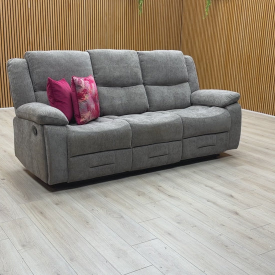 Product feature video demonstrating the manual reclining action and the functionality of the integrated drop-down cup holder console.