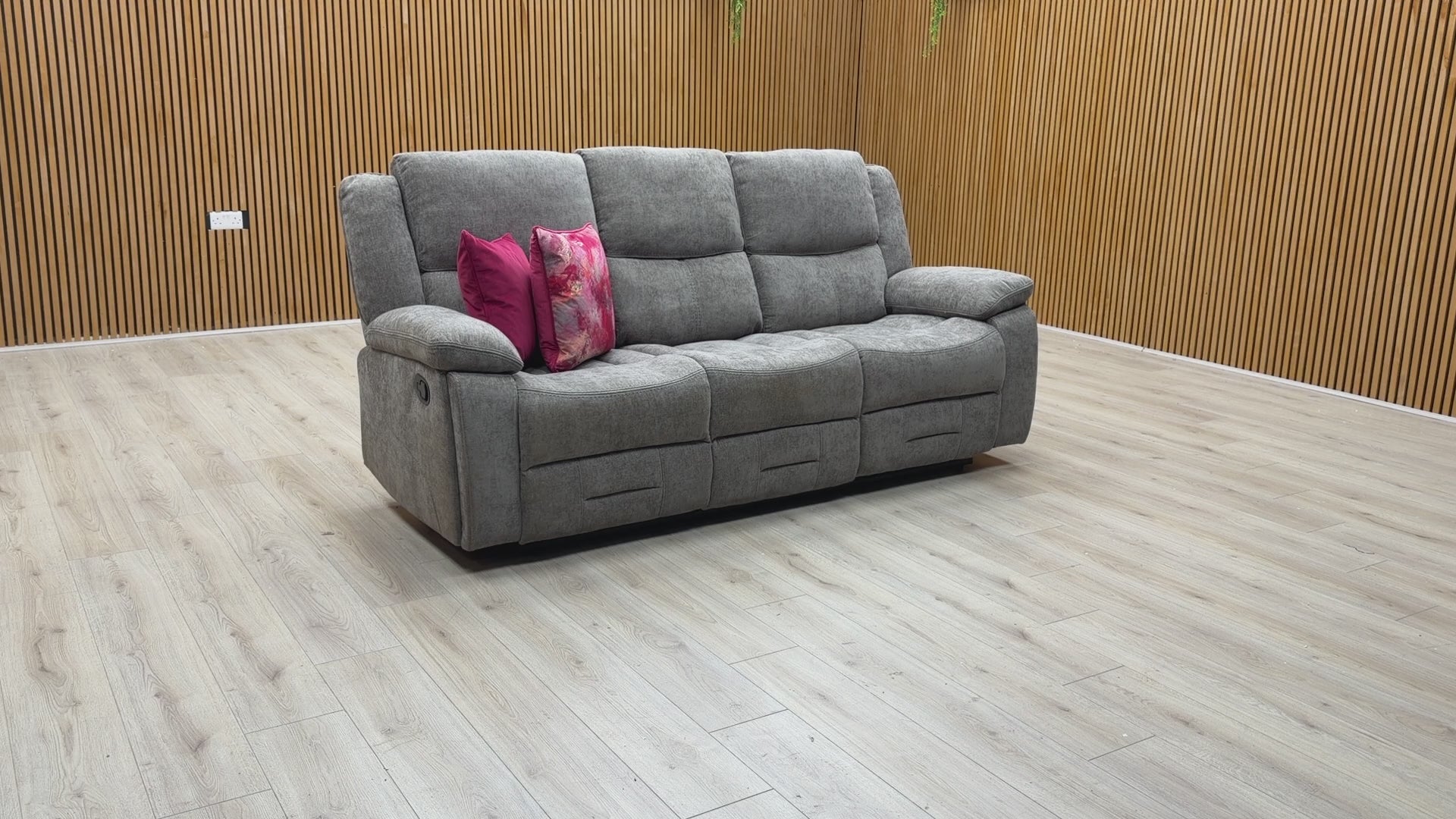 Product feature video demonstrating the manual reclining action and the functionality of the integrated drop-down cup holder console.