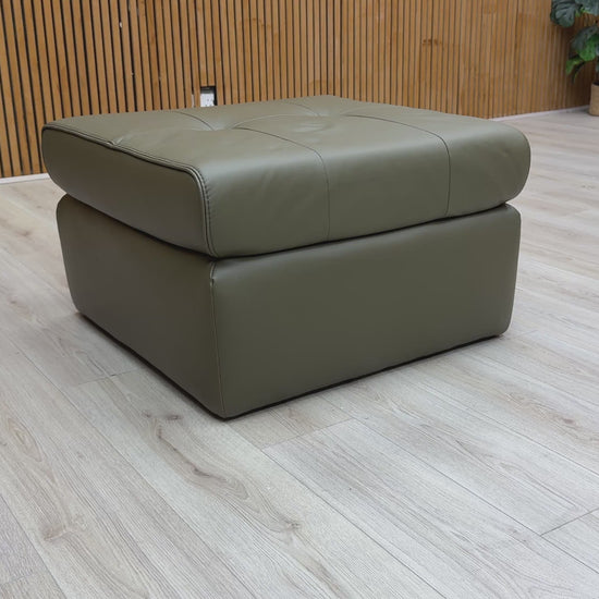 Video showcasing the construction, material, and full view of the 'Ava' Khaki Green Leather Large Square Footstool.