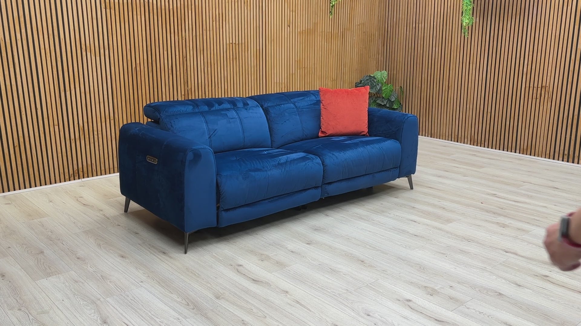 Video demonstrating the independent power reclining and power headrest functionality of the Ezra sofa.