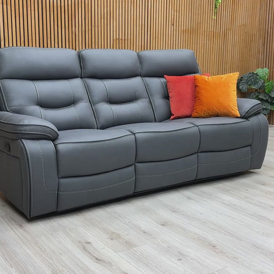 Product video tour of the ‘Dante’ Grey Fabric 3 Seater Manual Recliner, demonstrating the smooth latch-release mechanism and the full reclining range.