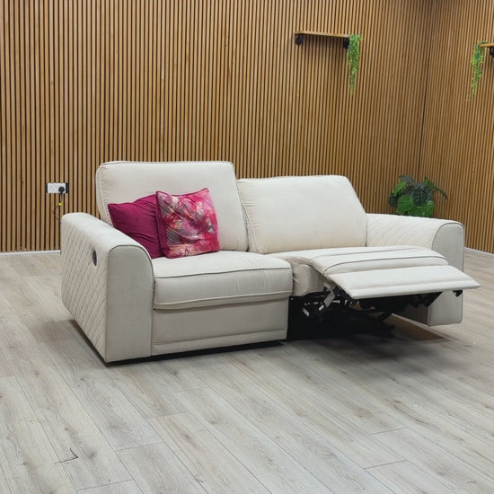 Video demonstration of the smooth motorised power recliner mechanism on the ‘Orka’ 3-seater cream fabric sofa.