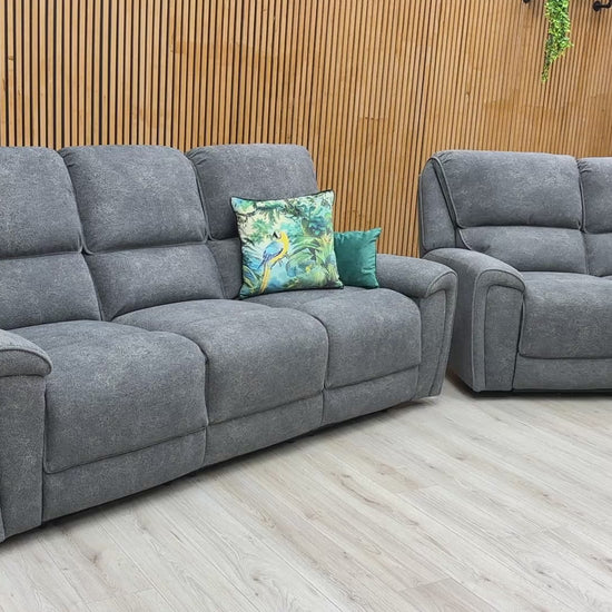 Video of the smooth electric power reclining function and USB charging port of the sofa set.