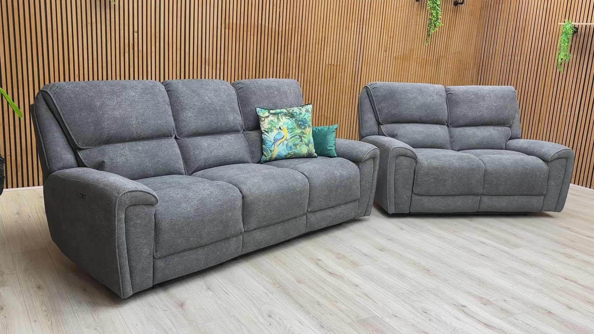Video of the smooth electric power reclining function and USB charging port of the sofa set.