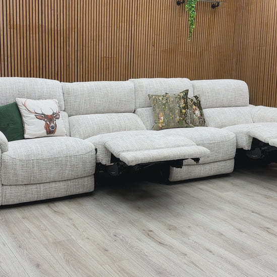 Video walkthrough showcasing the Nova beige fabric XL 4-seater power recliner sofa, demonstrating the smooth electric motor transition, wall-hugger clearance, and cushion fabric durability.