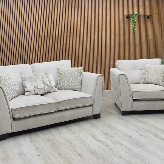 Video Of ‘Mariah’ luxury 2-seater sofa and matching armchair suite, beautifully upholstered in an elegant Dapple Ivory fabric and accented with sophisticated triple brass trim inserts.