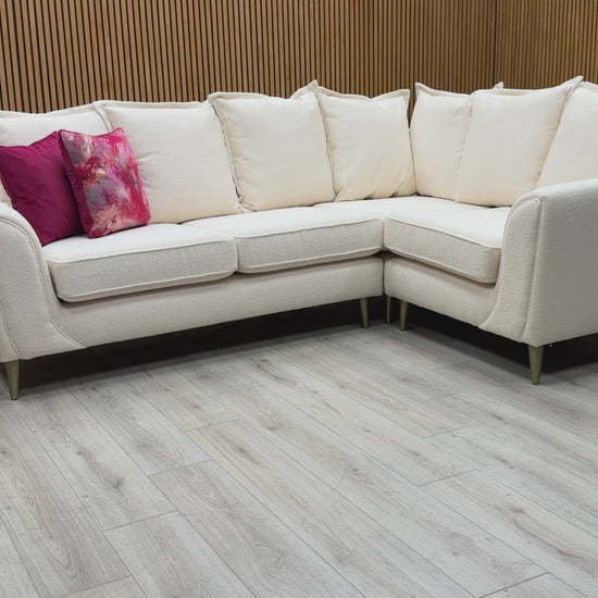 Product walkthrough video showing the comfort, fabric texture, and pillow back design of the Alyssia corner sofa.