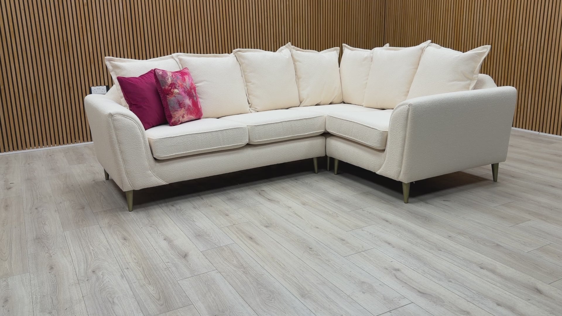 Product walkthrough video showing the comfort, fabric texture, and pillow back design of the Alyssia corner sofa.