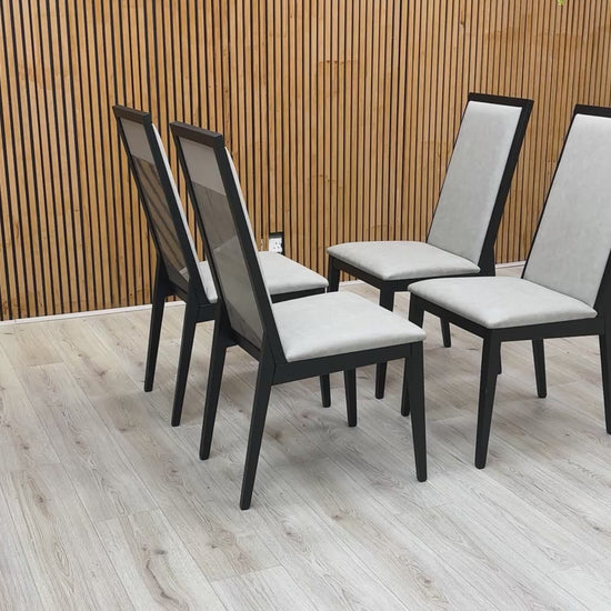 video showcasing the reflective high-gloss finish and the quality of the upholstered seat and back.