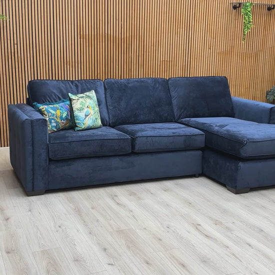 Video walk-around of the 'Chelsea' navy blue sofa, highlighting its scale, fabric texture, and elegant arm details.