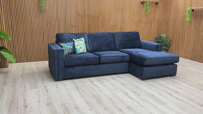 Video walk-around of the 'Chelsea' navy blue sofa, highlighting its scale, fabric texture, and elegant arm details.