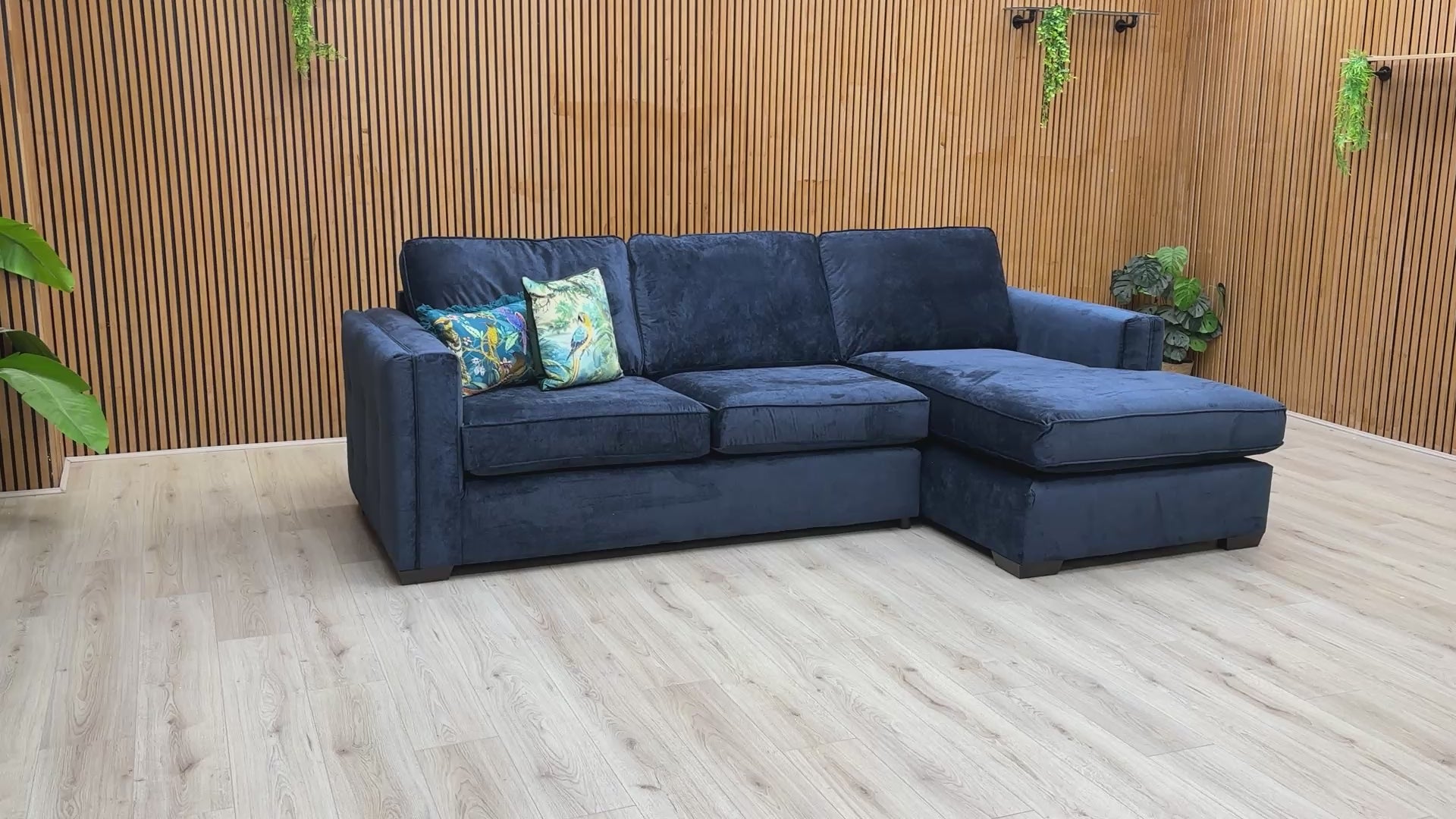 Video walk-around of the 'Chelsea' navy blue sofa, highlighting its scale, fabric texture, and elegant arm details.