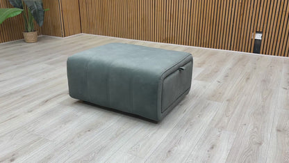 Video for a product video demonstrating the storage function and velvet upholstery of the 'Elphaba' Fern Green footstool.