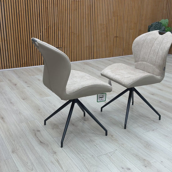 Video walkthrough showcasing the Raul pebble taupe fabric dining chairs, demonstrating the smooth auto-return swivel function, fabric texture under showroom lighting, and overall stability.