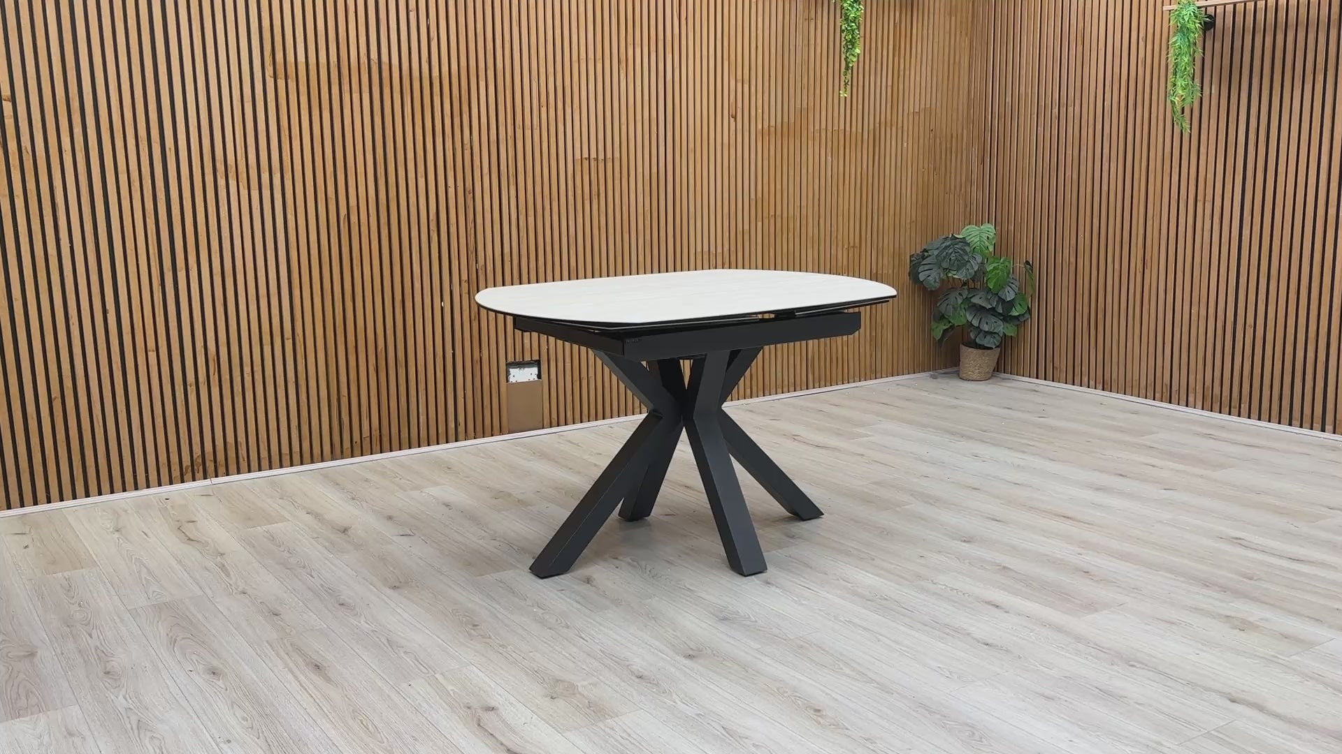 Product demonstration video showing the smooth 360-degree swivel mechanism used to extend the Raul dining table from a circle to an oval.
