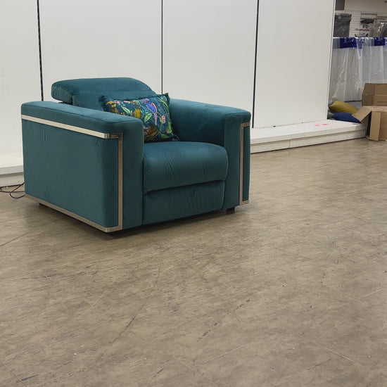 Video demonstrating the electric reclining function and adjustable power headrest of the 'Cora' teal velvet chair.